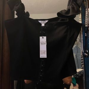 Corset hook and eye too with ruffle strap.